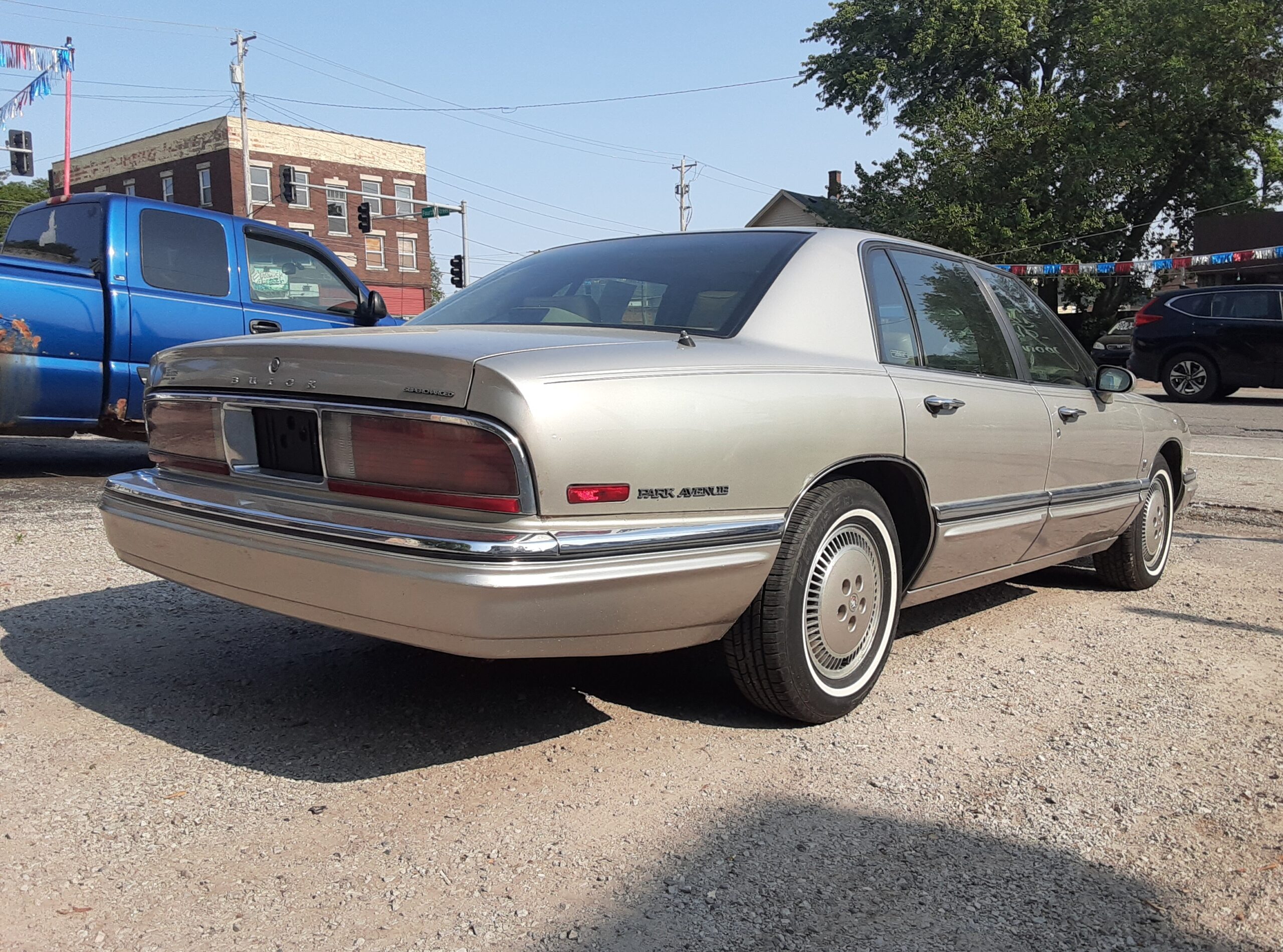 1996 Buick Park Avenue Ultra rear three quarter