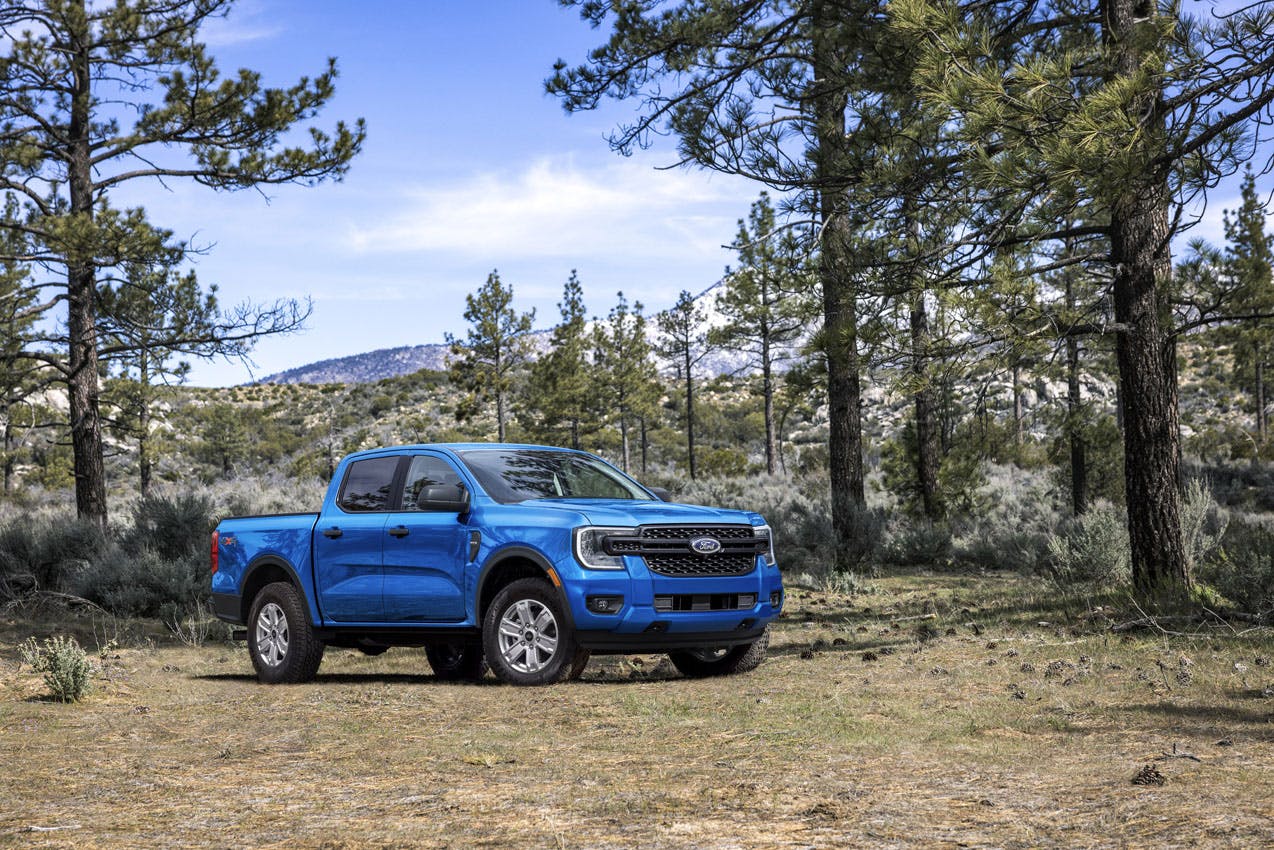 2024 Ford Ranger XL STX exterior front three quarter parked in woods