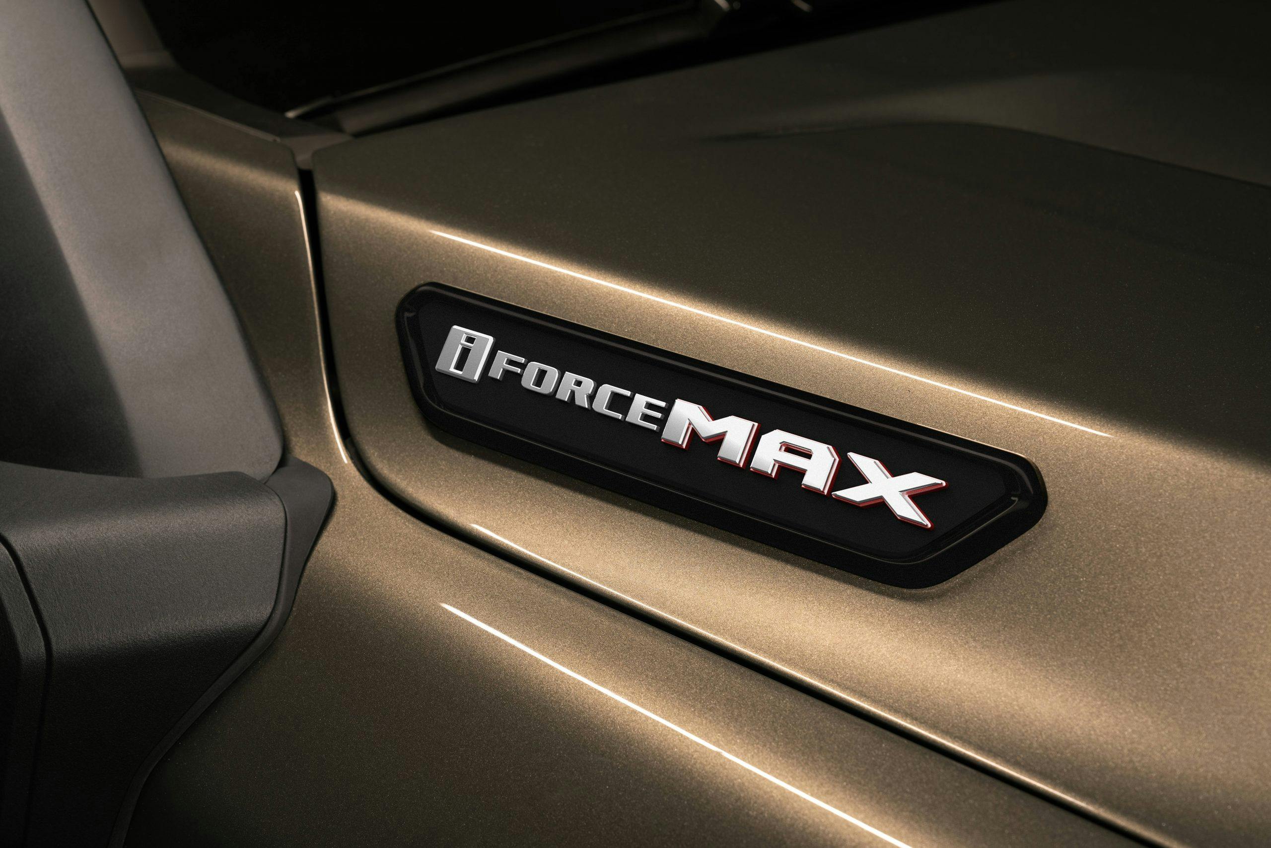 2024 Toyota Tacoma Trailhunter exterior i-Force MAX hybrid drivetrain badge detail