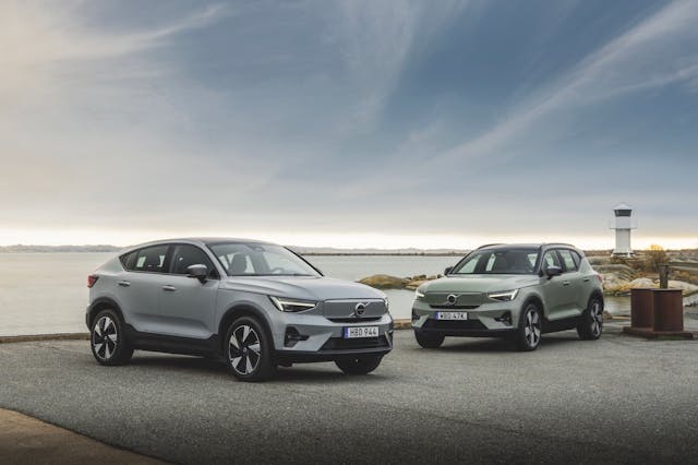 Volvo C40 Recharge and XC40 Recharge exterior front three quarters by beach