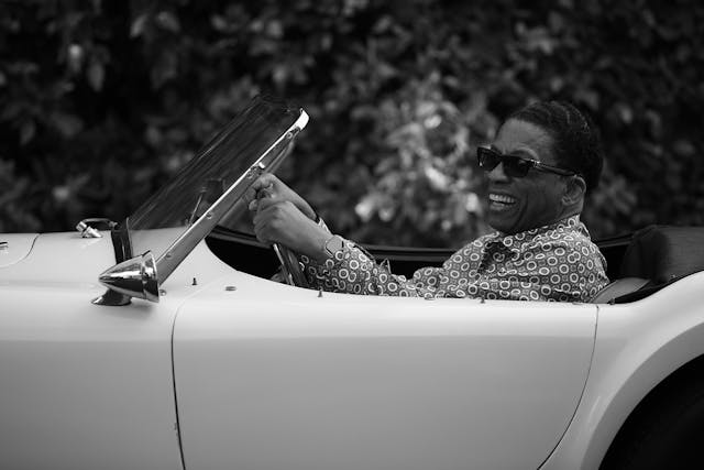 Herbie Hancock AC Cobra behind the wheel black white