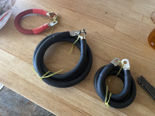 battery cables on workbench