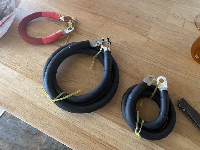 battery cables on workbench 