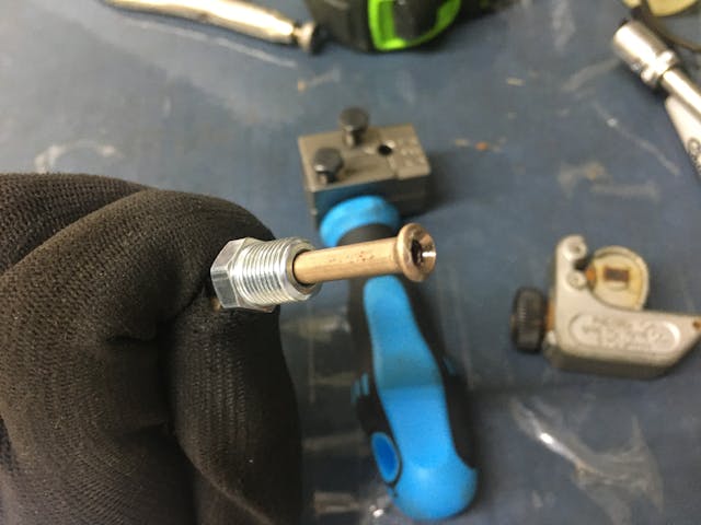 Siegel cylinder swap tubing screw closeup