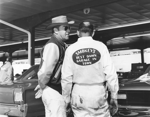 Driver Curtis Turner chats with car owner/mechanic Smokey Yunick