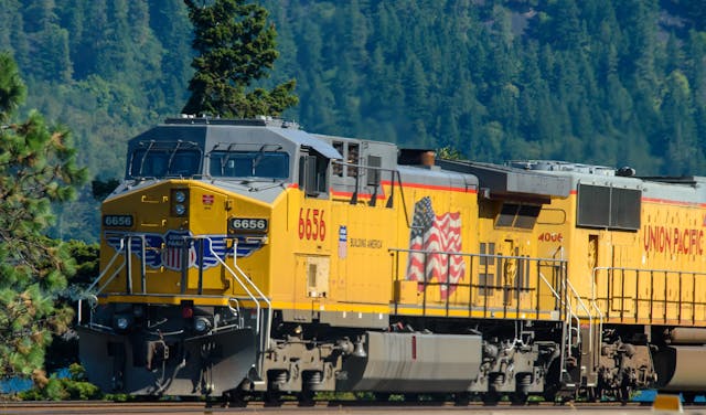 Union Pacific Diesel Locomotive train in the woods