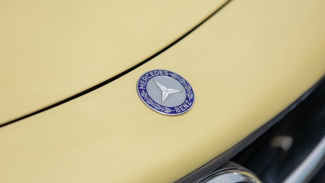 1961 Mercedes-Benz 300SL Roadster Fantasy Yellow emblem