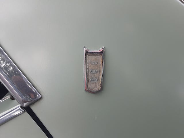 1964 Chrysler New Yorker badge