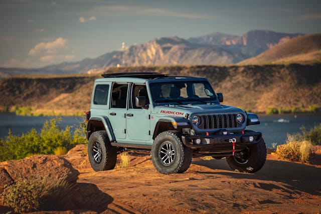 2024 Jeep Wrangler Rubicon X exterior front three quarter on rock