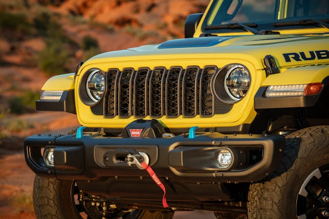 2024 Jeep Wrangler Rubicon 4xe exterior front end winch and grille detail yellow