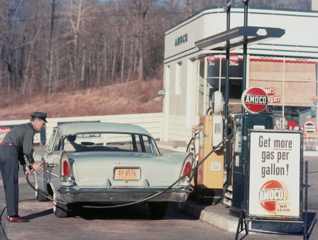 Chrysler At Gas Station 1958 vintage