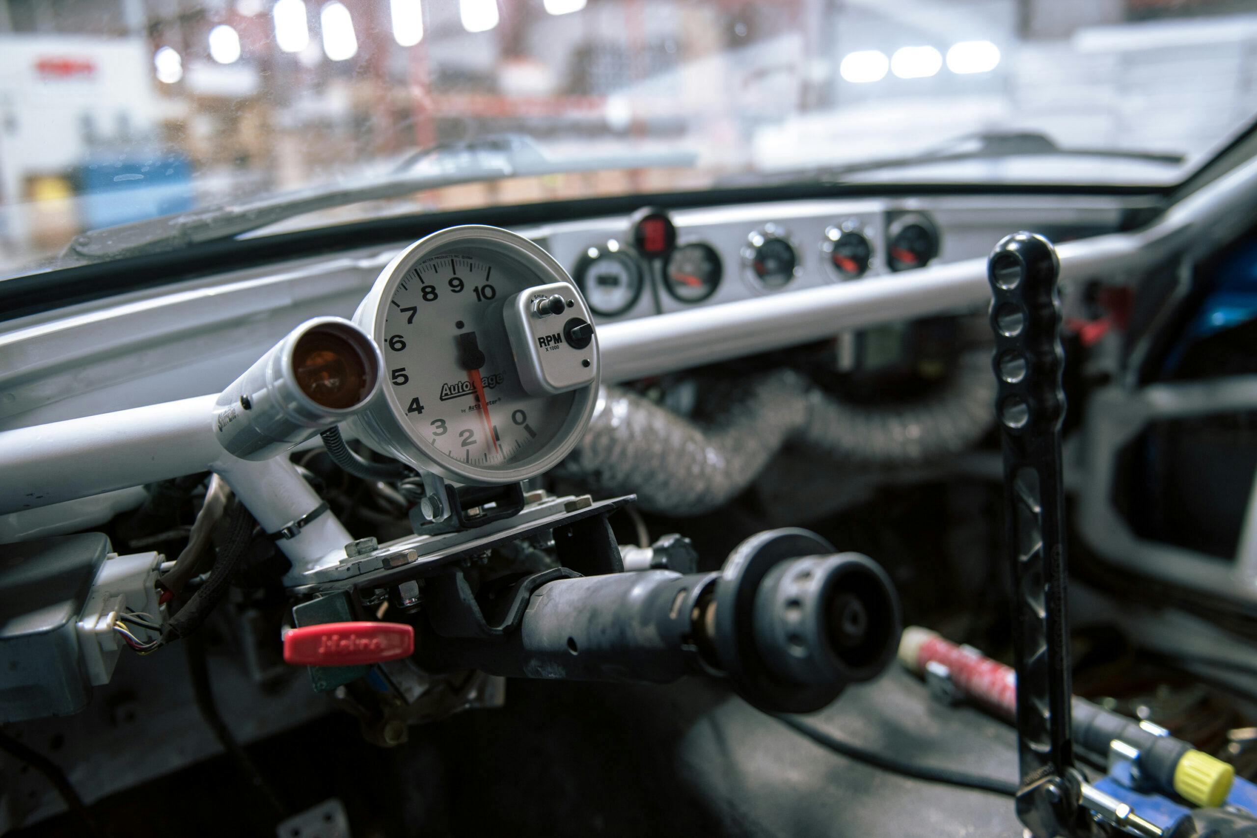 Flyin Miata race car interior gauges