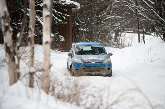 Team O'Neil rally school full stage rally Ford Fiesta in clearing