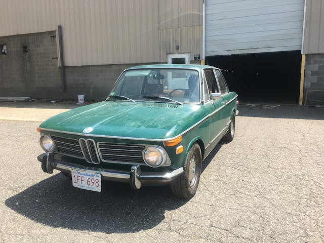 green vintage bmw front three quarter