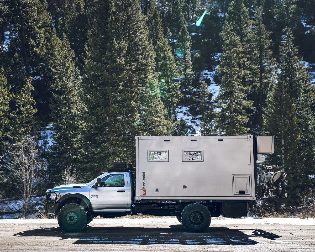 AEV x Bliss Mobil Prospector XL 550 exterior side profile in snowy mountains