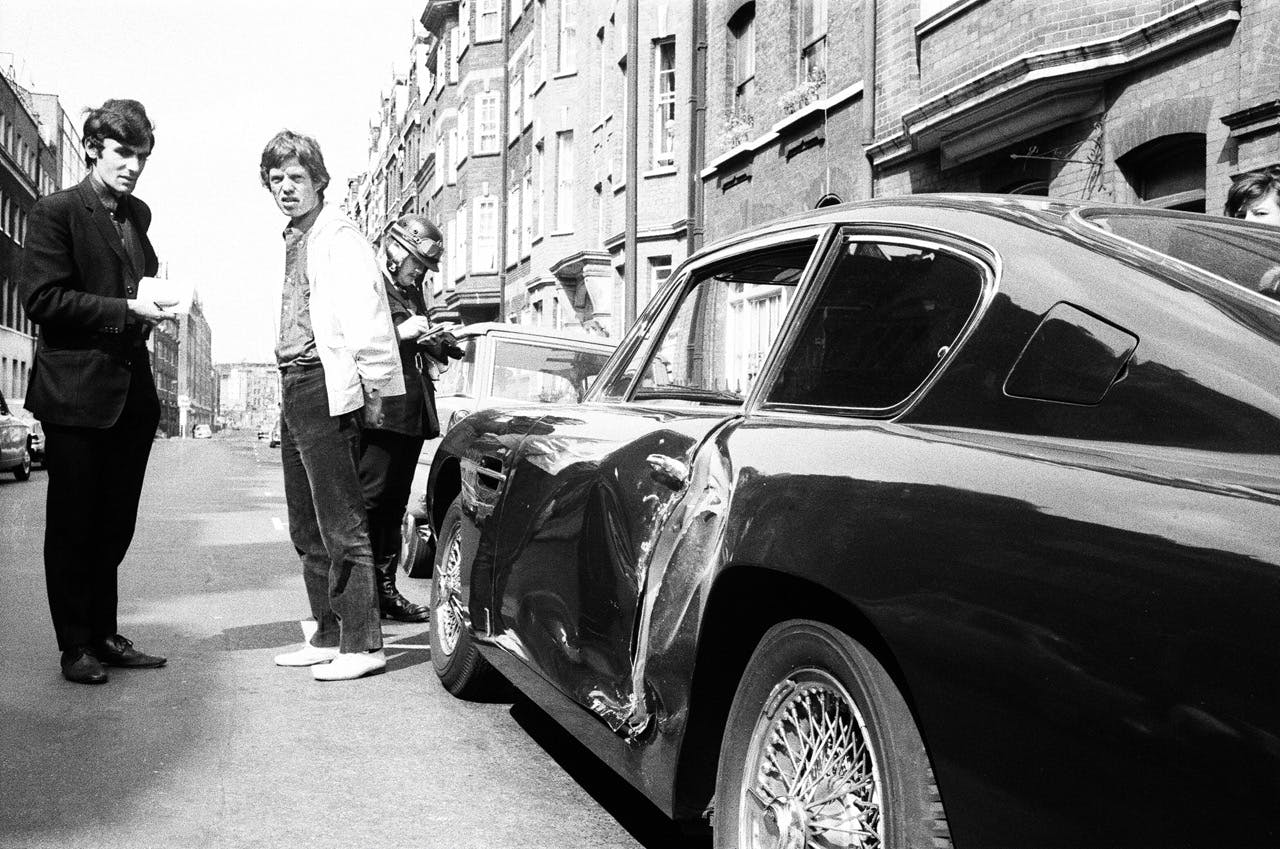 1966 Mick Jagger midnight blue Aston Martin DB6 accident side