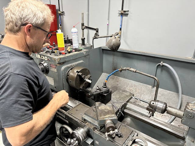 Davin next to lathe