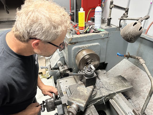 Davin turning bearing press in lathe