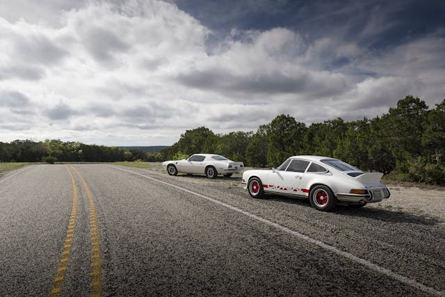 1973 Porsche 911 and Pontiac Trans Am roadside parked rear
