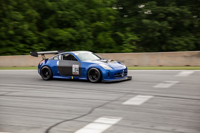Sasha Anis racing Nissan 350Z blue track action