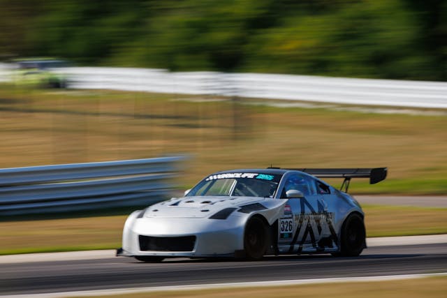 Sasha Anis racing Nissan 350Z grey track action