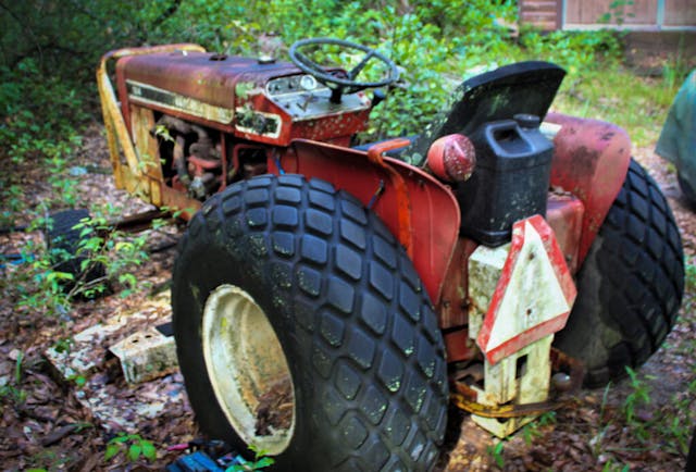 old vintage tractor rear three quarter