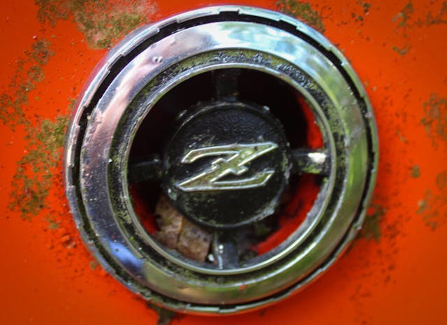 nissan z car badge patina