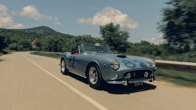 1960-Ferrari-250-GT-SWB-California-Spider-by-Scaglietti front three quarter driving action