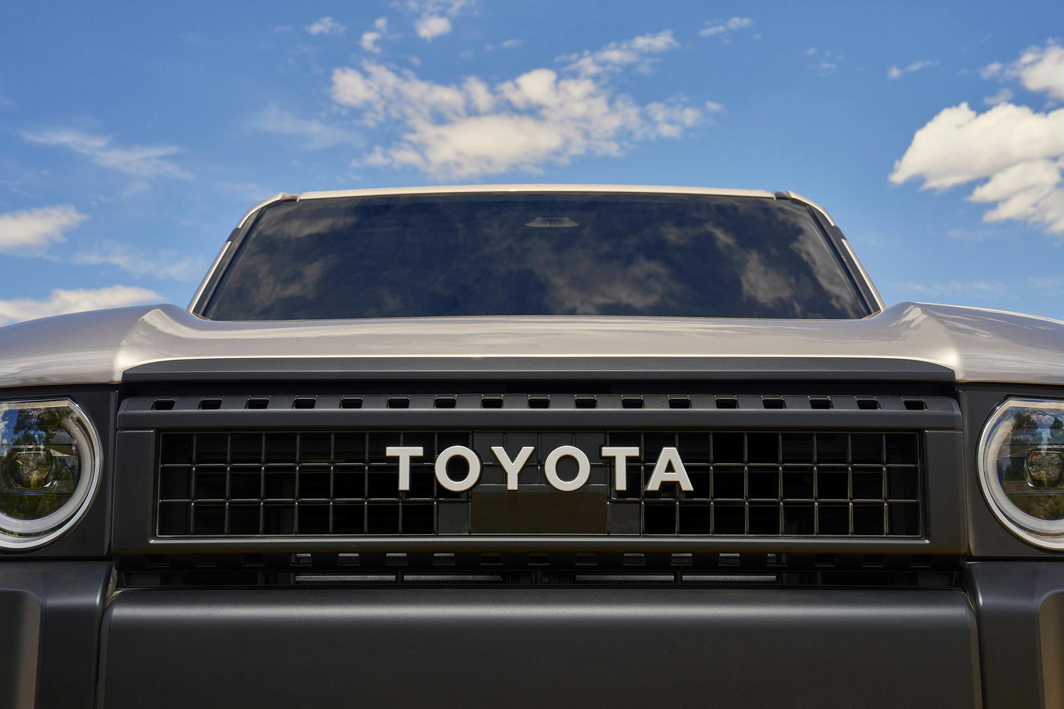 2024 Toyota Land Cruiser 1958 grade exterior grille and light details