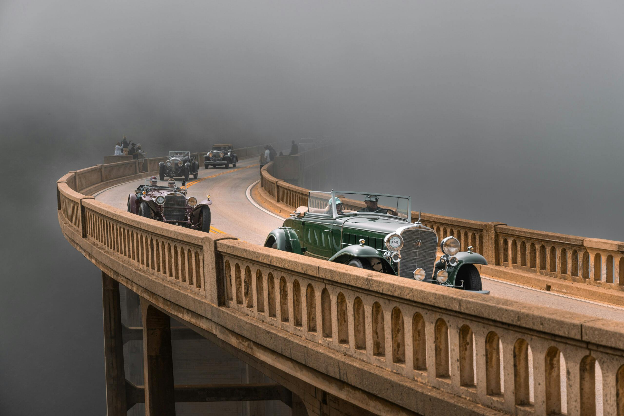 Pebble Beach Tour d’Elegance bridge crossing action fog