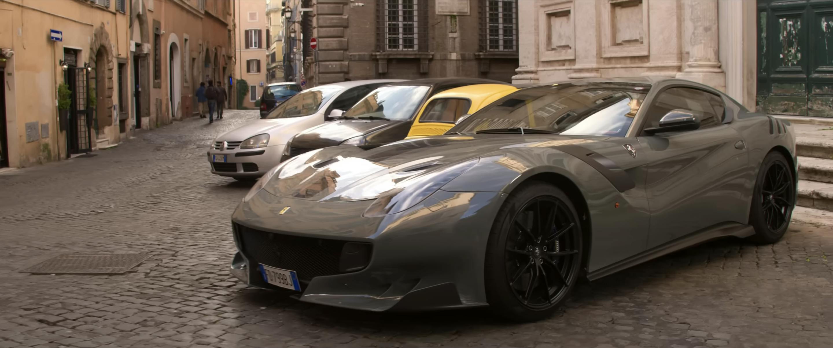 Mission Impossible ferrari F12tdf parked by yellow fiat 500 tom cruise