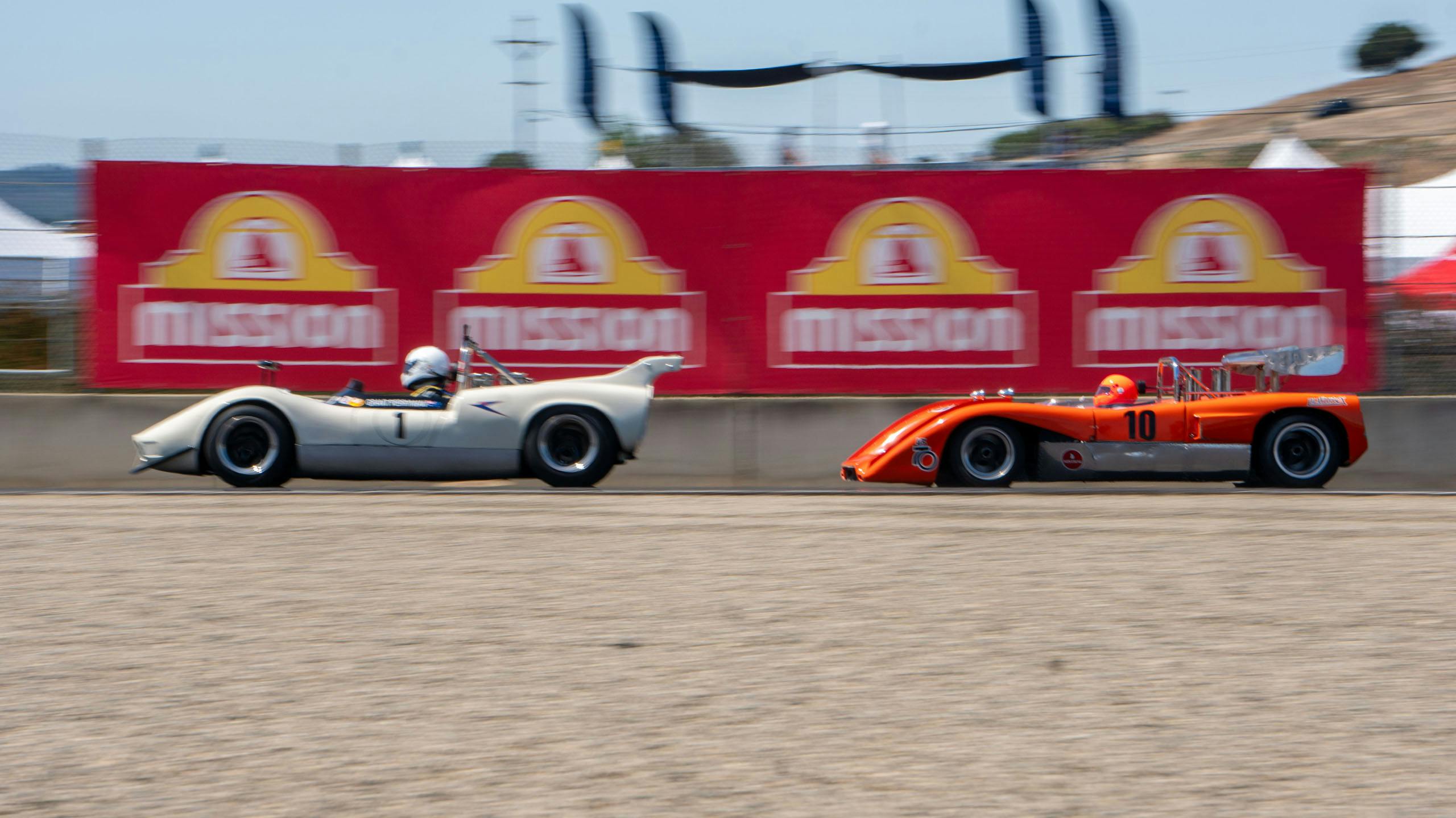 Monterey Historics 1966–74 Can Am / 1963–68 USRRC Two McLarens through turn 4