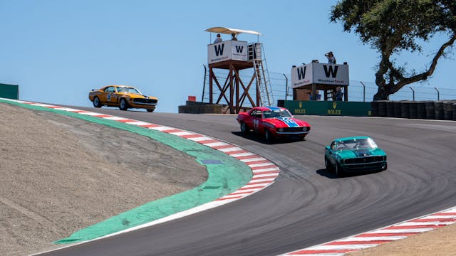 Monterey Historics 1966–72 Historic Trans Am Two Mustangs and a Camaro through Corkscrew