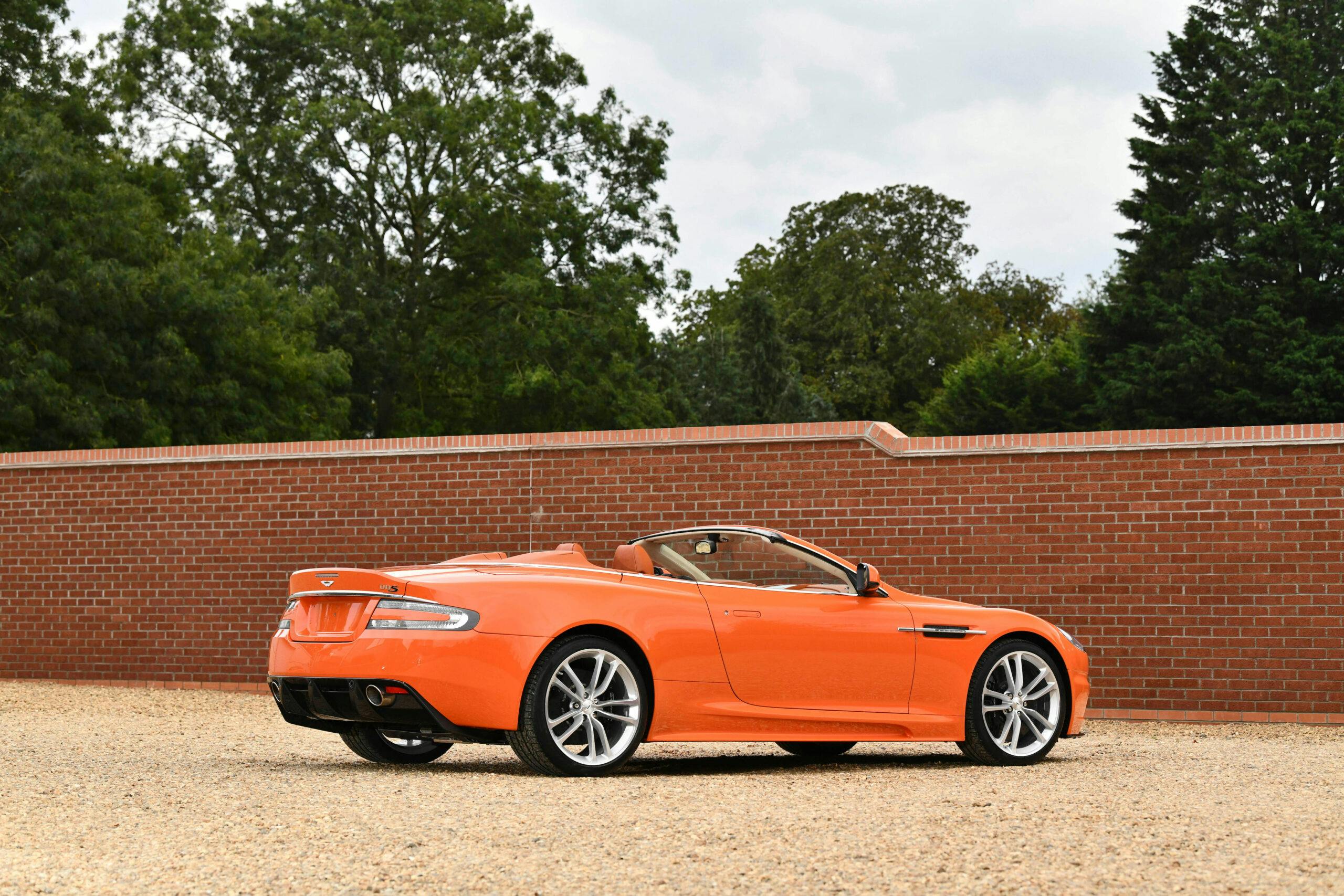 2011-Aston-Martin-DBS-Volante orange rear three quarter