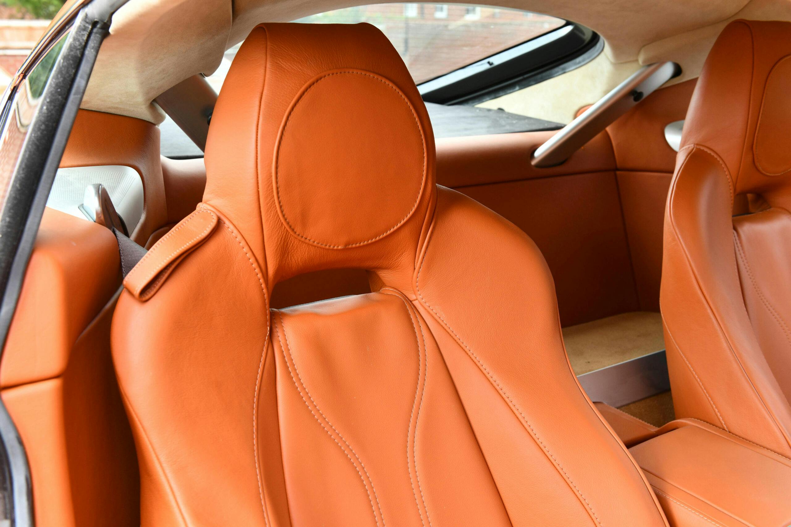 2011-Aston-Martin-DBS-Volante orange interior front seat