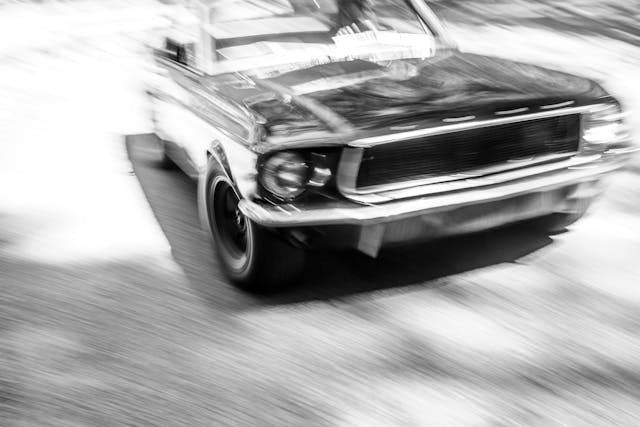 Crustang Ford Mustang Patina car action pan blur black white