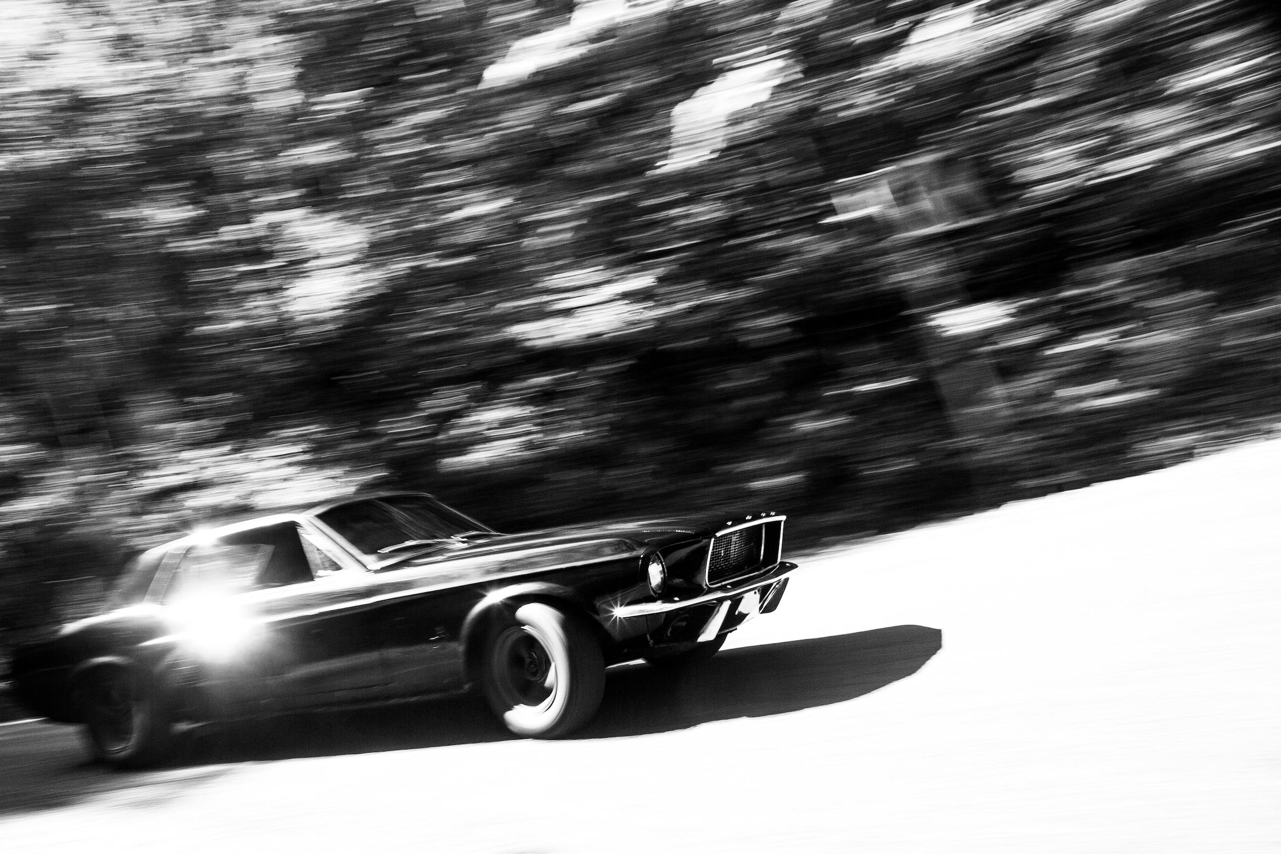 Crustang Ford Mustang Patina car action pan blur black white