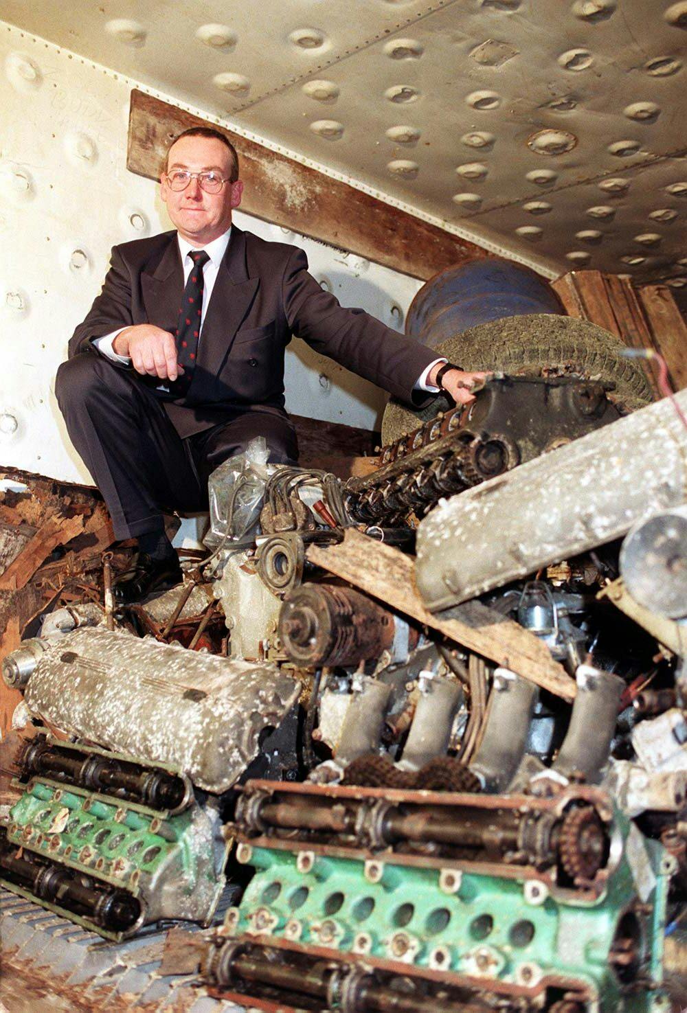 Detective Super Terry Ives sitting on Lord Brocket recovered engines classic car theft scam