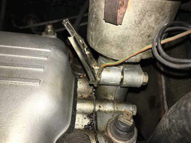 wire alligator clipped to engine ground oil sensor