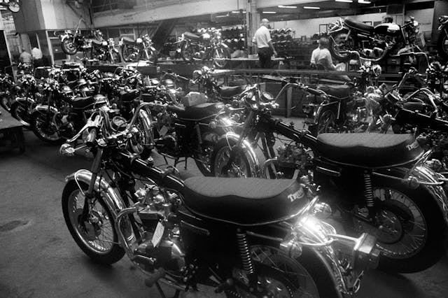 Ready to receive their petrol tanks are these Bonneville motorcycles