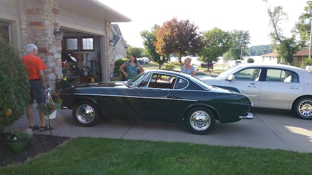 1967 Volvo 1800S green side view