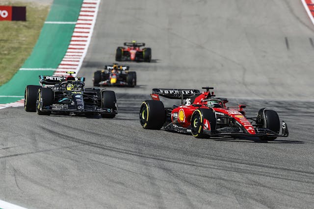 2023 Formula 1 United States Grand Prix Charles Leclerc and Lewis Hamilton Mercedes and Ferrari on track