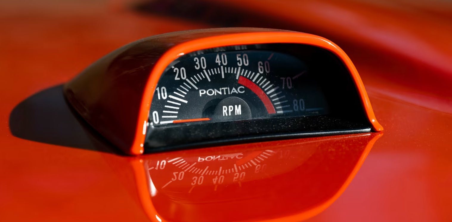 Pontiac GTO hood tachometer detail