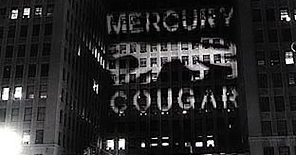 1967 Mercury Cougar GM building projection marketing war stunt