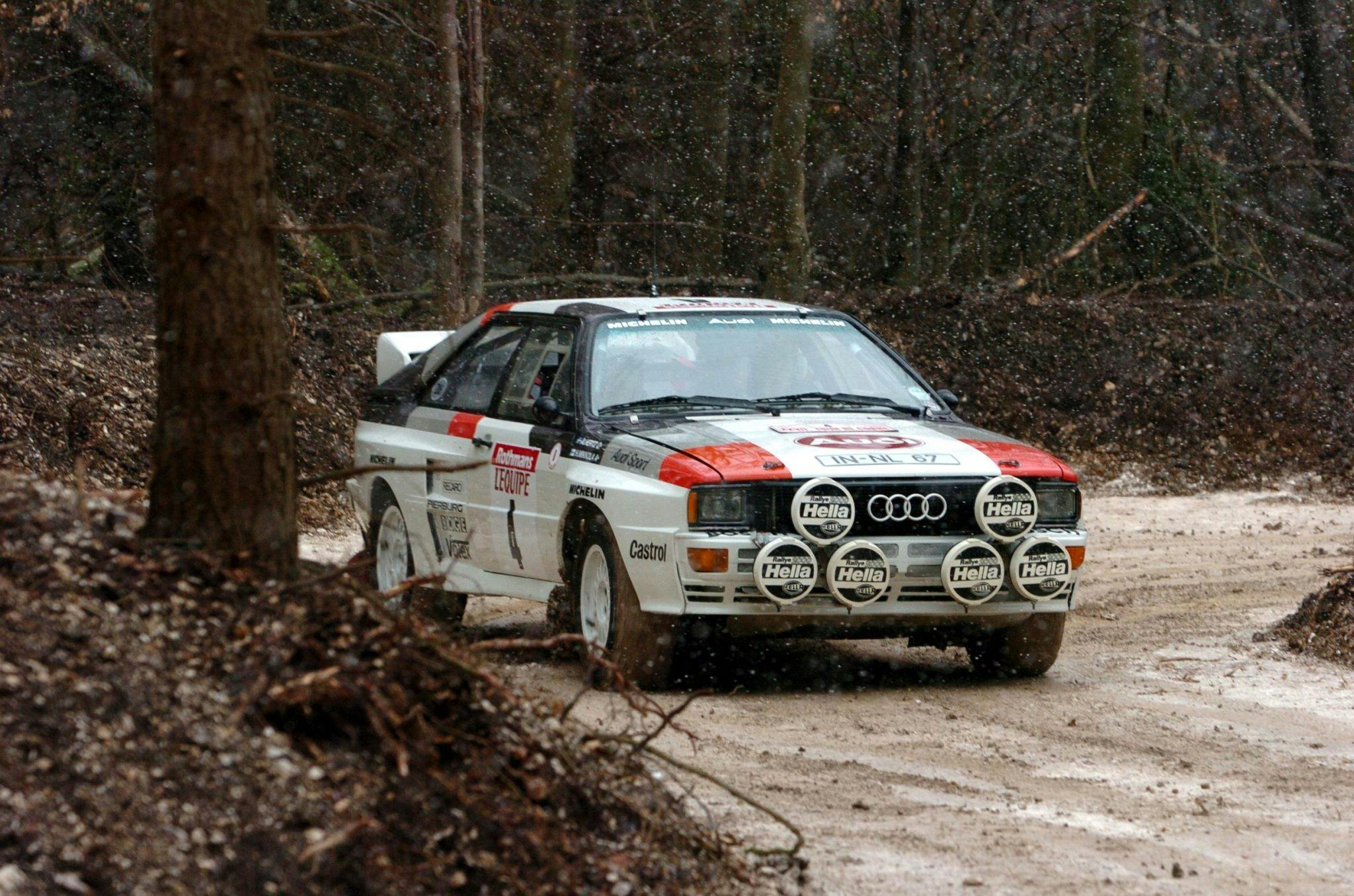 Audi Group B rally car action snowy trail