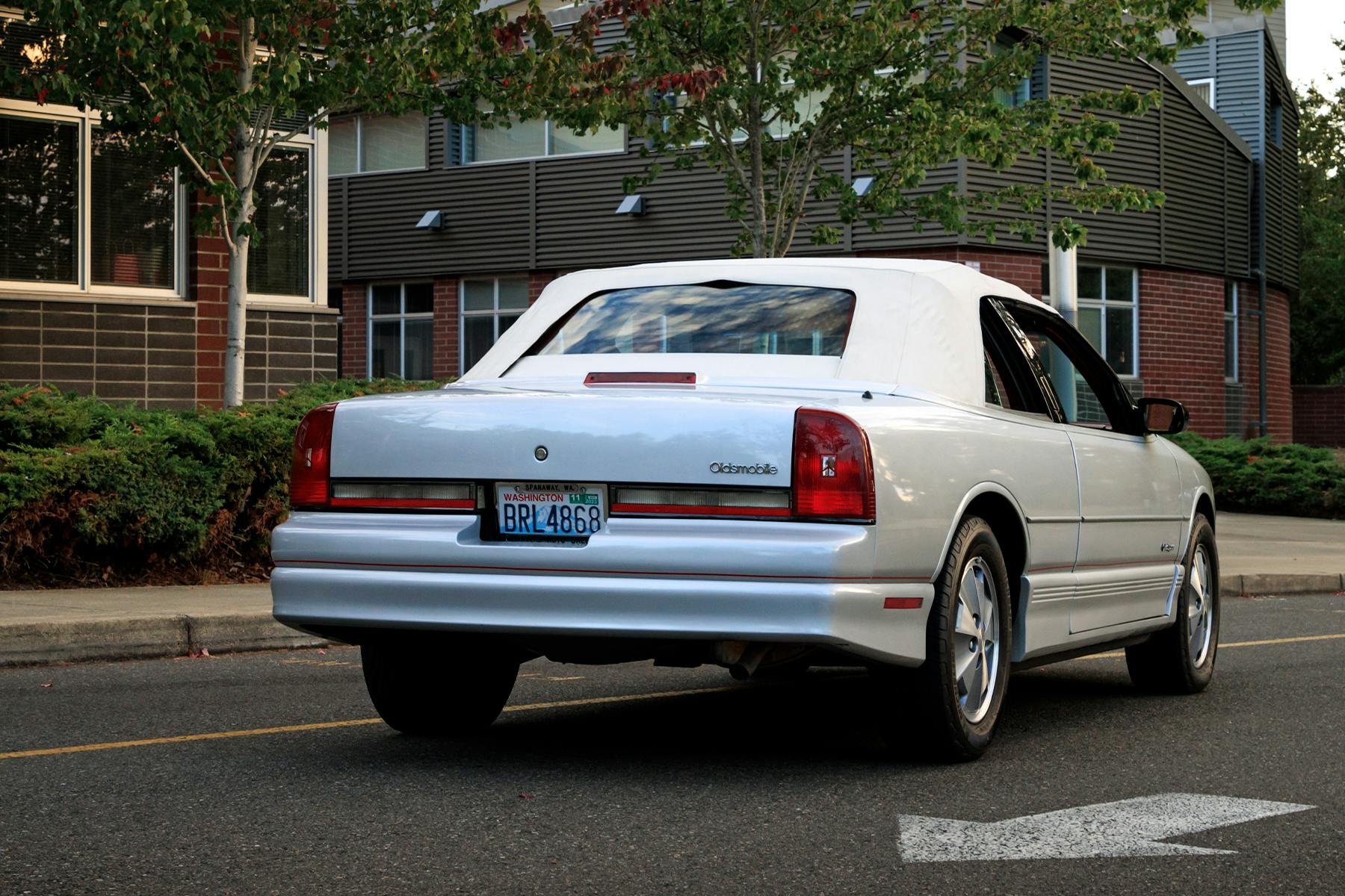1991 Oldsmobile Cutlass Supreme Convertible rear three quarter top on