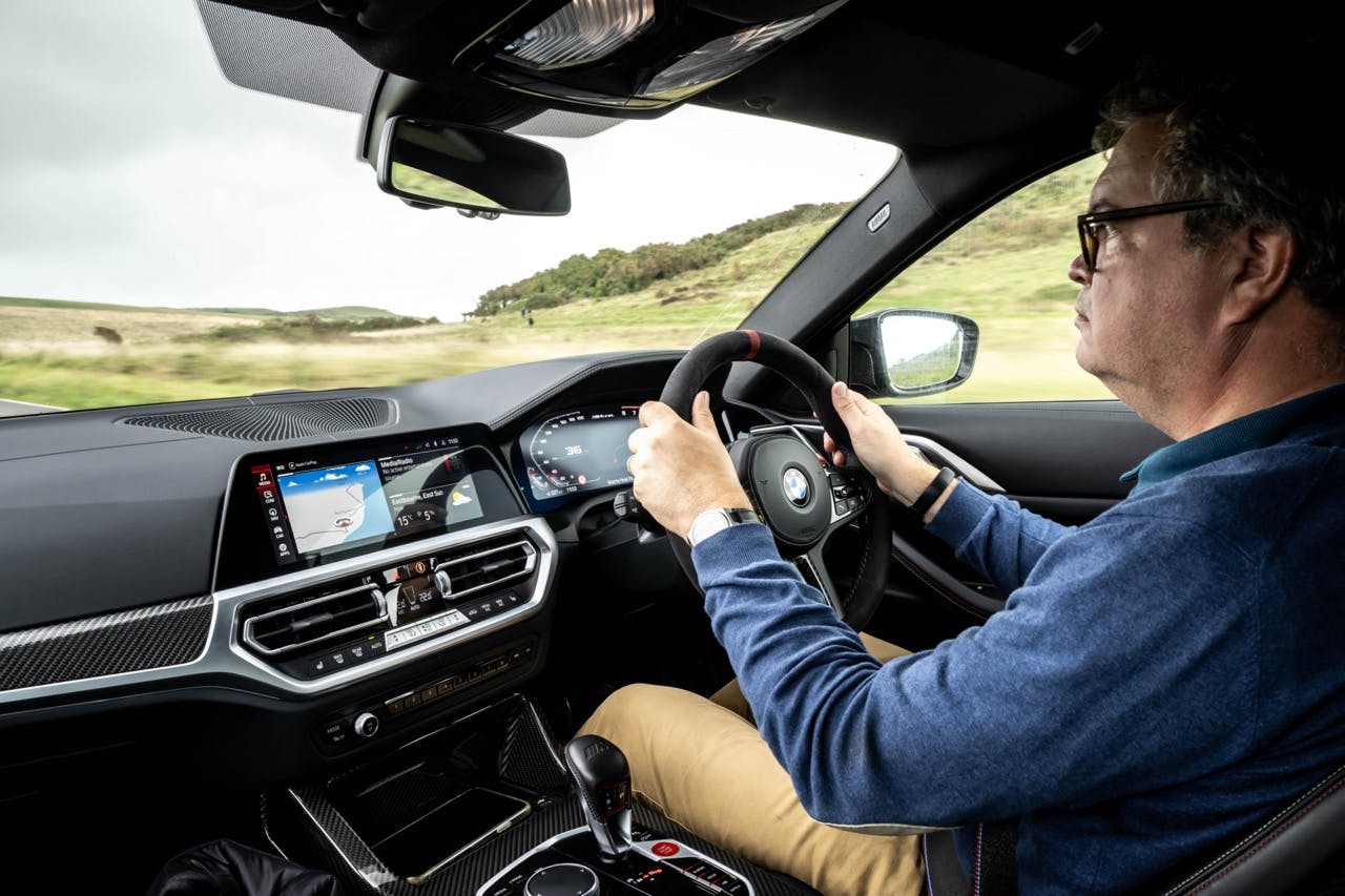 BMW M4 CSL interior driving action