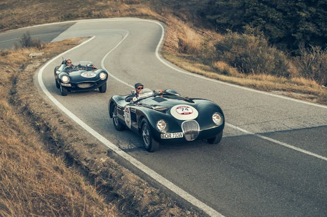 Jaguar C-Type Continuation high angle road driving action