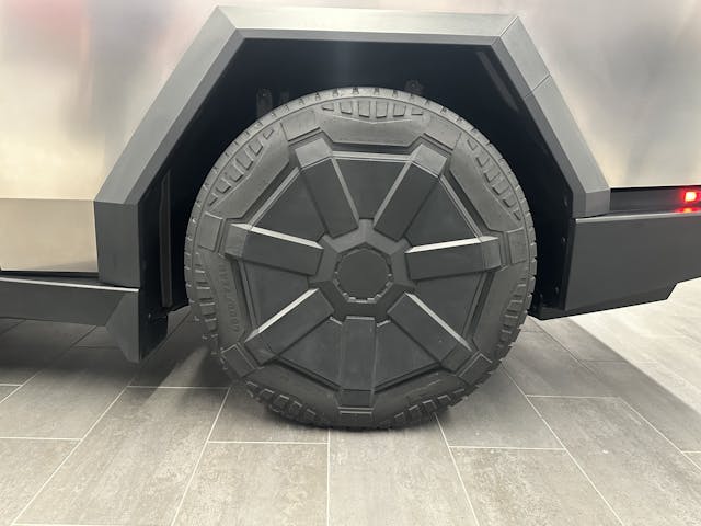 Tesla Cybertruck store display wheel tire closer