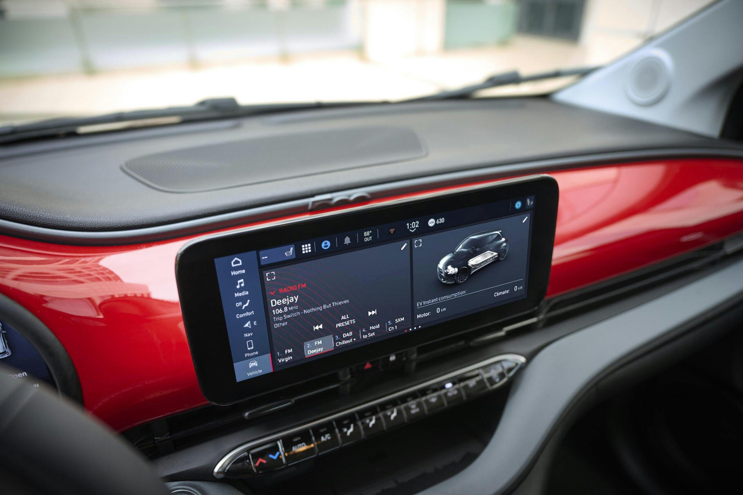 Detail of the center screen of the 2024 Fiat 500e (RED).